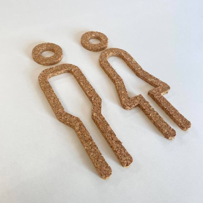 Selvklæbende korkfigurer til dørskiltning, repræsenterer mand og dame i minimalistisk stil.